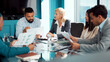 © FlexOn/peopleimages.com - Meeting, documents and business people in office for planning finance review with budget report. Discussion, paperwork and financial advisors with investment proposal in collaboration in workplace.