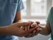 © Jai Izzam - Doctor Holding Child Hand Trust Empathy