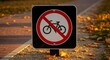© Herlin - Bicycle Restriction Sign Illustrating Prohibition in Nature Against a Path