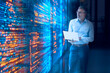 © Westend61 - Engineer analyzing data on tablet in modern server room