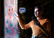 © Westend61 - Engineer interacting with AI chatbot technology using augmented reality