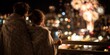 © MNStudio - Couple wrapped in shared blanket on balcony hold champagne glasses watching fireworks burst over city skyline. Magical New Year's midnight toast, romantic celebration vibe.