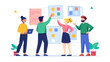 © Mdfahad - Diverse team collaborates on a project planning board