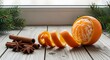 © Helen - Fresh mandarin orange with cinnamon sticks and star anise on a wooden table
