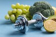 © Efil - Healthy lifestyle concept with dumbbell and fresh fruits and vegetables.