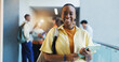 © DavidsPrime/peopleimages.com - College, portrait or woman in hallway with tablet, knowledge or scholarship in study opportunity. Happy, tech or student in university with confidence, education and pride in academic funding.