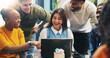 © DavidsPrime/peopleimages.com - Laptop, happy people or meeting in agency to review proposal, collaboration or brainstorming. Plan project, brand awareness or marketing team with pc for campaign ideas, online trends or strategy