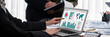 © InfiniteFlow - Panorama shot analyst team utilizing BI Fintech to analyze financial report with laptop. Businesspeople analyzing BI data dashboard displayed on laptop screen for business insight. Prodigy