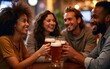 © Richard - Multiracial group of happy friends has fun while toasting with beer in pub. High quality