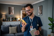 © Migma_Agency - Male doctor using mobile phone, providing telemedicine consultation