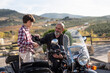 © Antonio Recena - Little boy with his grandfather on sidecar bike.