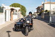 © Antonio Recena - Little boy with his grandfather on sidecar bike.