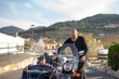 © Antonio Recena - Little boy with his grandfather on sidecar bike.