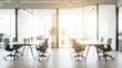 © Volodymyr Shcherbak - A blurred view of a modern office space with tables chairs and glass walls