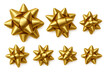 © Krtola  - Golden decorative bows in various sizes, perfect for adorning presents and gifts during holiday seasons and special occasions