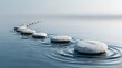 © NandaCreative - Stone Pathway Leading Across Calm Water Creating Ripples Suggesting Journey