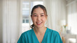 © ChayTee - Young adult woman asia people anti aging expert modern nurse happy smile worker live home video call screen selfie look at camera mental health care Online digital virtual asian tele consult clinic.