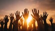 © Johannes - diverse hands reaching up together symbolizing unity teamwork and collaboration against a warm sunset background