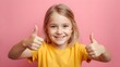 © Intellectual - Happy Blonde Girl Giving Thumbs Up and Smiling Against a Pink Background, Cheerful and Positive Expression of Approval, Childhood Joy and Innocence Captured in a Vibrant Portrait