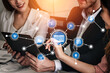 © InfiniteFlow - A business team engages in serious discussion over a tablet, exploring digital marketing strategies with a network of advertising icons, symbolizing innovation. Tessel