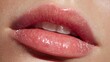 © Jojo* - Extreme close up macro shot of beautiful female lips with glossy pink lip gloss.