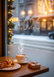 © urooj - Cozy 2026 New Year's scene with coffee, croissant, and gift by the window.