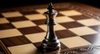 © Saikan - Single king chess piece dominating the checkered board strategy setup