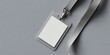 © chelmicky - Blank identity badge with lanyard on gray background