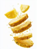 Pineapple slices falling with refreshing juice splash