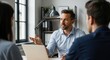 © crewart - Professional advisor engages in serious discussion with two seated individuals across a desk