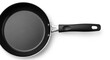© GraphicVisuals - Nonstick frying pan ready for culinary creations and delicious meals, ideal for cooking demonstrations or product advertisements for kitchenware brands