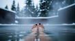 © Vadym - Woman feet with black pedicure relaxing in outdoor thermal pool, hot spring bath in winter snow, snowy forest background, nordic spa wellness and luxury travel vacation concept