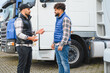 © Serhii - Truck drivers discussing logistics and transport business