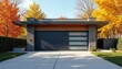 © Pete - Modern garage exterior with stone pillars and wood accents. Sleek dark door features frosted glass panels. Autumn trees with bright orange and yellow leaves surround house.