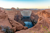 Glen Canyon Dam and Bridge in Page, Arizona. A concrete arch-gravity dam built by the Bureau of Reclamation on the Colorado River forms Lake Powell within Glen Canyon National Recreation Area.