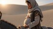 © Olga Ко - Cinematic side view of pregnant Virgin Mary riding a donkey in the desert during sunset journey to Bethlehem