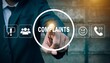 © Onetrick  - Man using virtual touchscreen clicks word: complaints. Concept of complaints. Customer complaint, dissatisfaction from product or service problem, angry feedback from client. Complain on everything.ai
