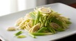 © Fathurrahman - Freshly Sliced Lemongrass on White Plate for Asian Cuisine Preparation