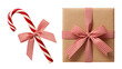 © DrexDesign - Classic holiday gift and candy cane with festive red striped ribbon, ready for Christmas giving