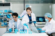 © Nuttapong punna - A scientific research team collaborating in a modern laboratory, conducting experiments, analyzing samples, and using advanced lab equipment