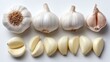 © ittipol - A visually appealing arrangement of fresh garlic, showcasing whole bulbs, cloves, and sliced pieces. Ideal for culinary, health, or organic food themes in stock photography.