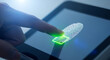 © MYS Design - Digital fingerprint scan on tablet screen for identity verification, data protection, and secure access; authentication concept