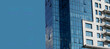 © PanArt - multi-storey building skyscraper architecture city. Modern buildings with glass facades. copy space