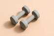 © Sarah - Pair of Dumbbells on Pastel Background