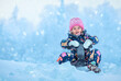 © kucherav - Happy little girl sledding in snowfall winter