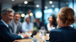 © Kateryna - Entrepreneurs and corporate individuals conference in meeting space faceless business people defocused boardroom background professional gathering scene strategic discussion