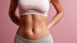 © Anat art - Female Abdomen With Soft Fat Folds Against a Neutral Pastel Background in a Professional Stock Style Setting