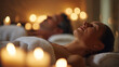 © Maksim Shebeko - Two people enjoy a peaceful spa experience surrounded by flickering candles and soft ambient light Generative AI