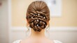 © Mela Angraini - Elegant Braided Updo with Pearl Accents for a Special Occasion 2.