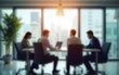 © Daniel - Blurred background of a modern office interior with blurred business people working in a team at a table. High quality